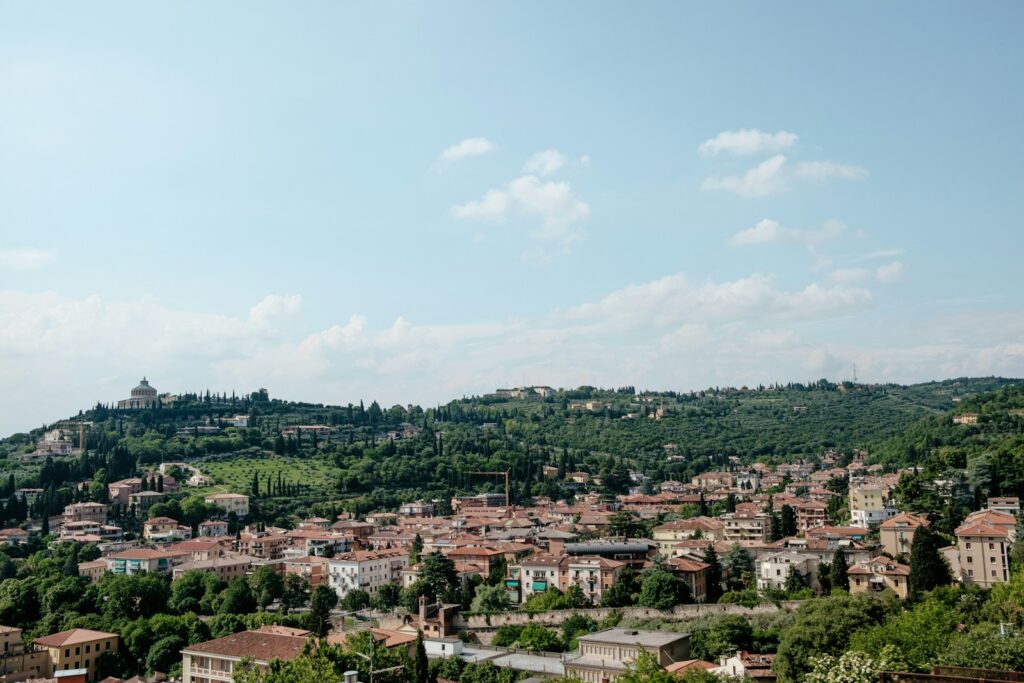 a small town nestled on a hill in the middle of a valley